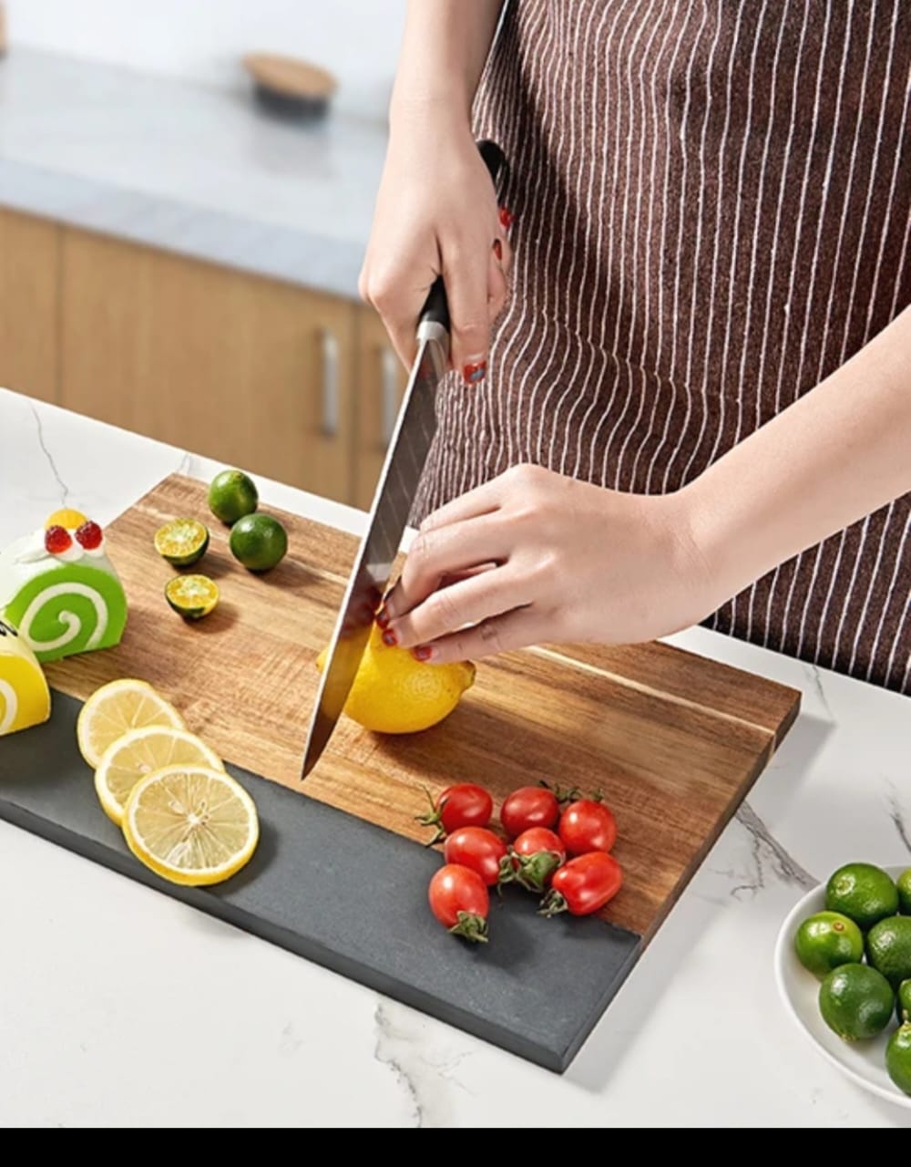 Rectangular acacia wood cutting board with natural marble stitching, black and white.