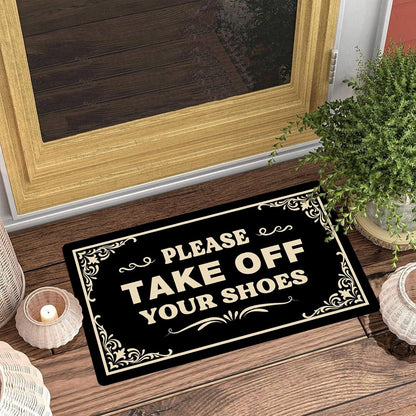 Black non-slip doormat with cream text message 50x80cm
