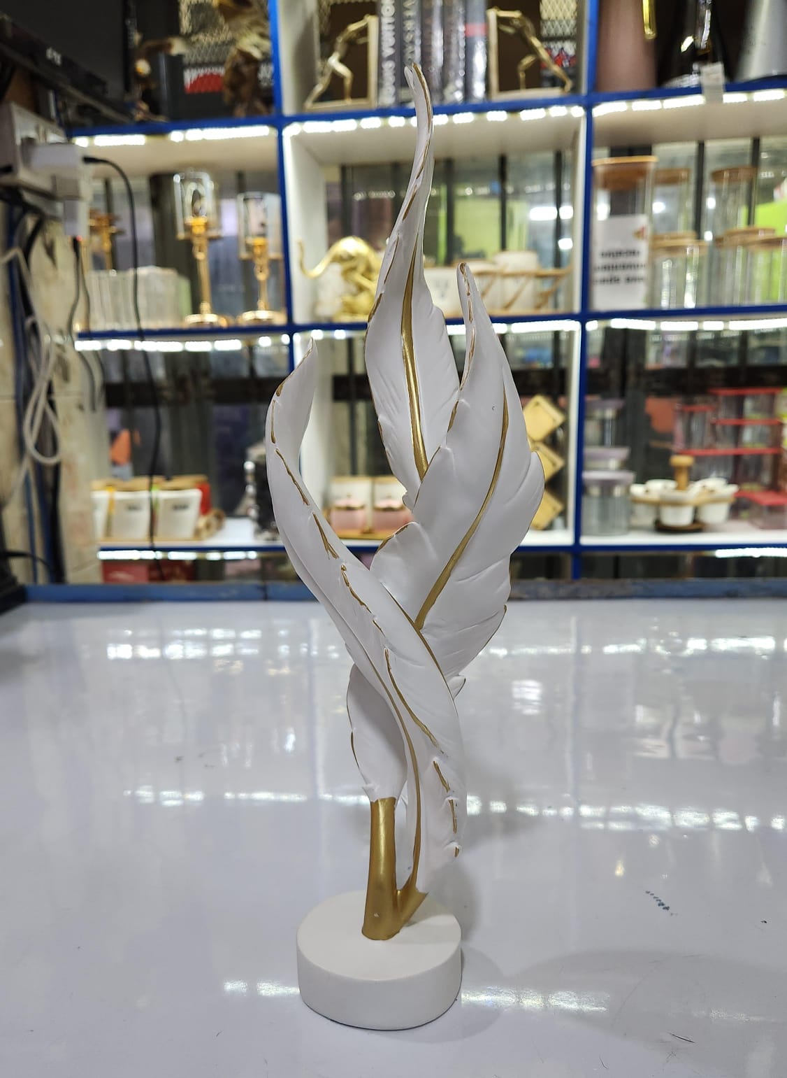 White and Gold Resin Feather Art Ornament