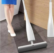 Self squeezing sponge roller mop with absorbent sponge head