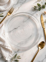 Handcrafted crystal clear glass plate with ribbed detailing, sturdy construction, and microwave friendly design.