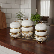 Three-piece ceramic canister set labeled for sugar, coffee, and tea.