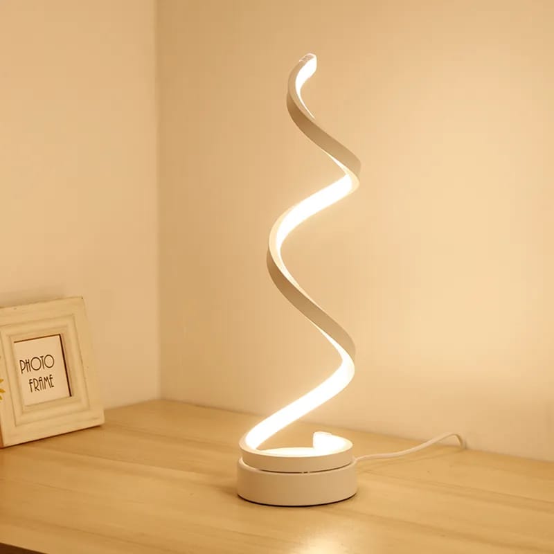 White vertical spiral LED table lamp with warm and white light options
