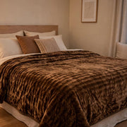 Soft 5 × 6 ft mink blanket for warm and comfortable bedroom or living room use.