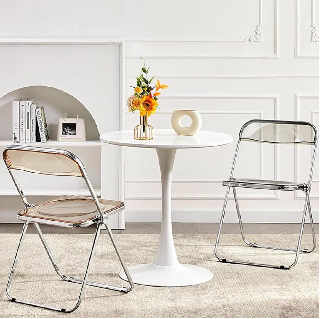 Transparent acrylic folding chair with chrome frame for modern indoor and outdoor seating