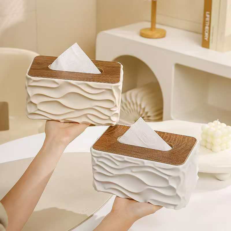 Luxury wave texture tissue box holder with wood look top cover available in white and beige.