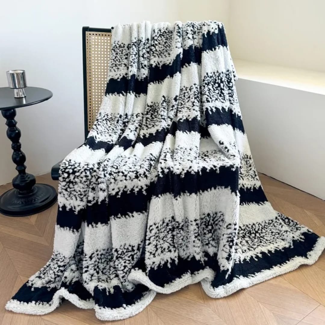 Soft heavy fleece blanket with large size and stylish colors for cozy home comfort. 