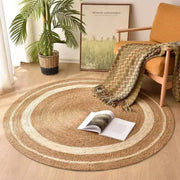 Hand braided round natural jute rug with woven design for stylish home floor décor