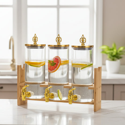 3-Piece juice dispenser set with gold lids and bamboo base 2.2 litres each