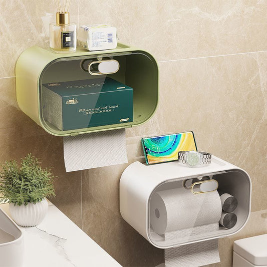 White wall mounted tissue box with gold plated finish and storage tray.