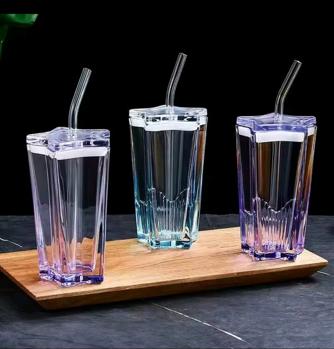 Pentagonal heavy-duty glass tumbler with straw, 380ml capacity, in assorted shades.