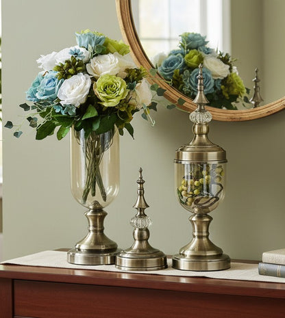 European clear glass vase with gold metal accent around the neck