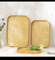 Set of 3 bamboo serving trays with grid bottom design for serving and home décor.