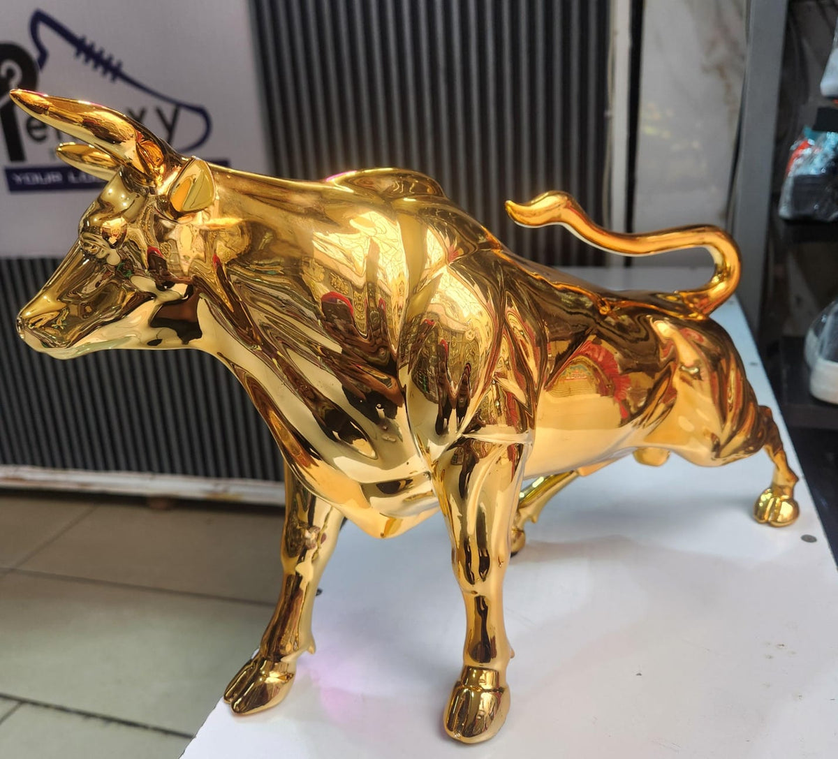 Golden Charging Bull Sculpture