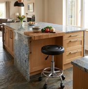 Black adjustable hydraulic rolling stool with caster wheels for comfortable and flexible seating