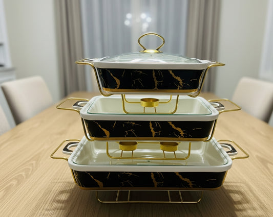 Set of three ceramic chafing dishes for serving hot meals