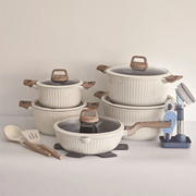 Granite sufuria cookware set with casseroles, pan, glass lids, and silicone spoons.