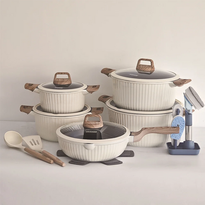 Granite sufuria cookware set with casseroles, pan, glass lids, and silicone spoons.