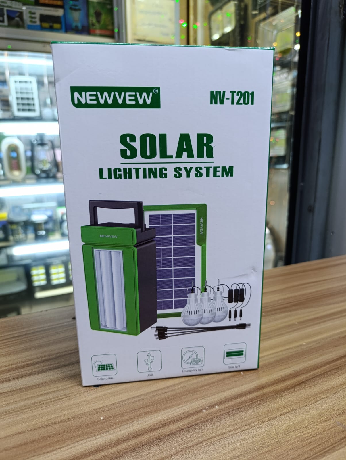 Complete solar lighting system NV-T201 with 3 LED bulbs, side light, and mobile charging