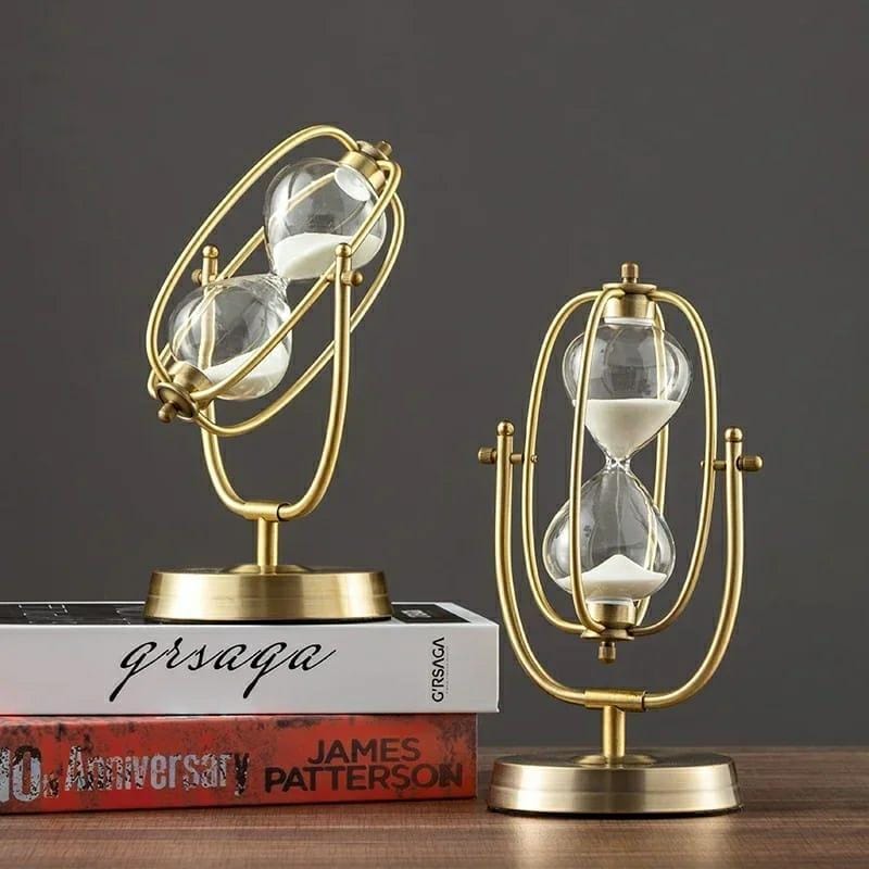 Metal 1 hour hourglass sand timer with clear glass chambers and reusable rotating design.