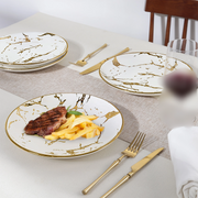 6-piece ceramic dinner plate set with unique patch-pattern designs for everyday dining and table presentation.