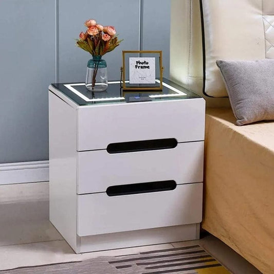 Wooden bedside cabinet with LED glass top and drawer storage.