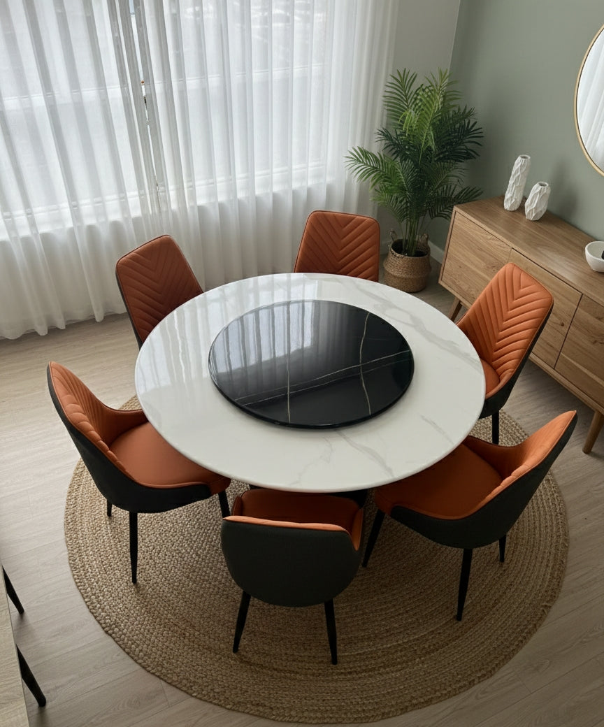 6-Deater Round dining table with marble top and six chairs.
