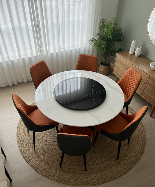 6-Deater Round dining table with marble top and six chairs.
