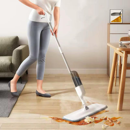 Wet and dry water spray mop with refillable bottle and fan-shaped spray system.