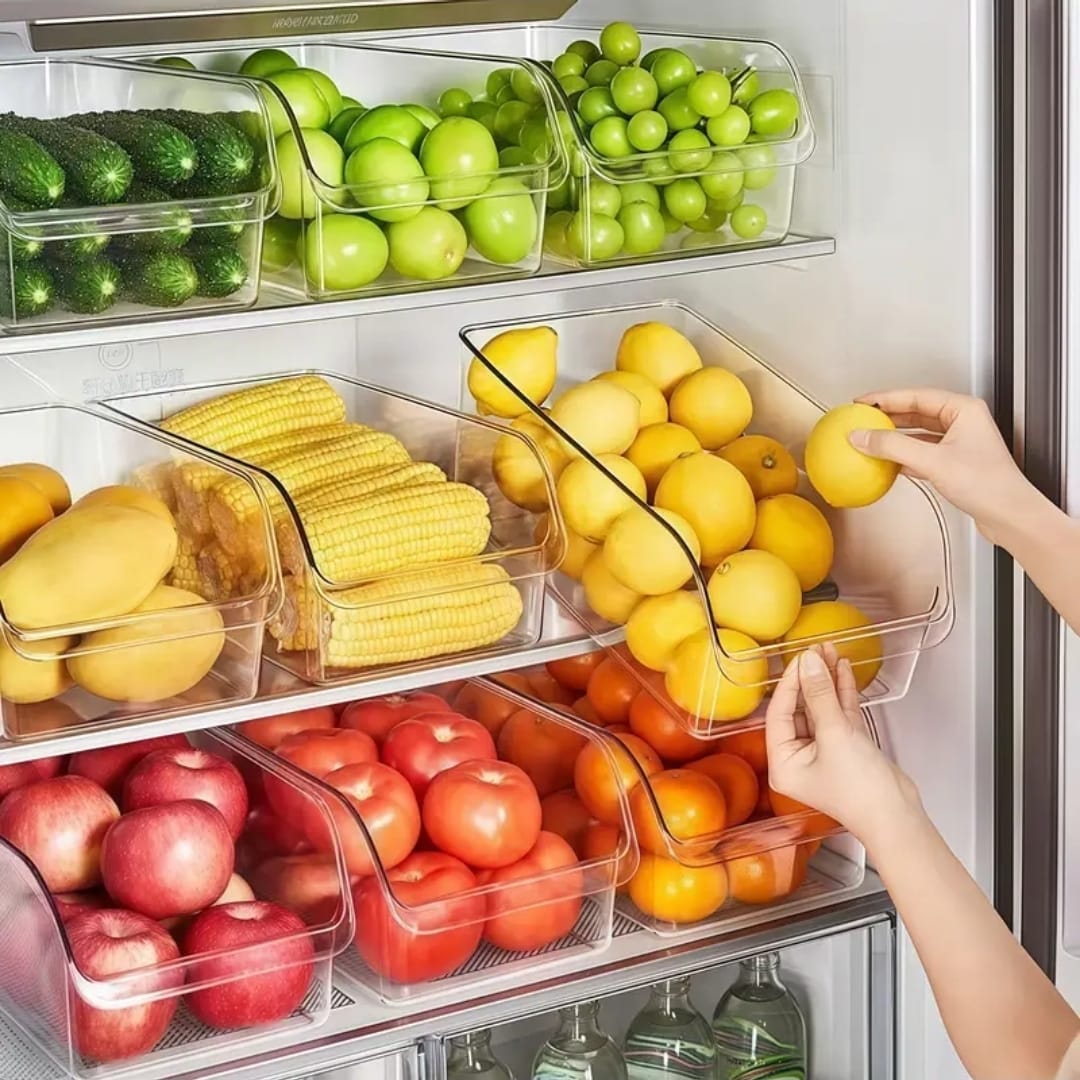 Clear acrylic fridge storage box for organizing beverages, fruits, vegetables, and condiments.