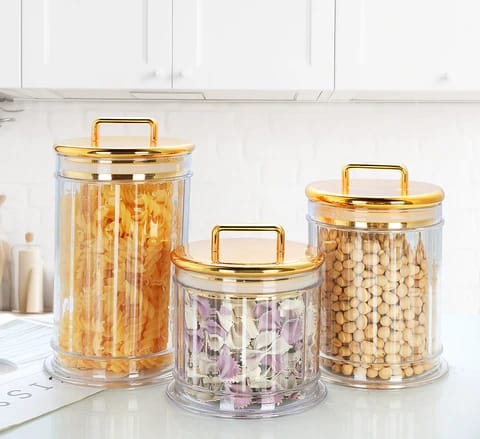 Golden acrylic storage jars set of three for tea, sugar, and kitchen organization
