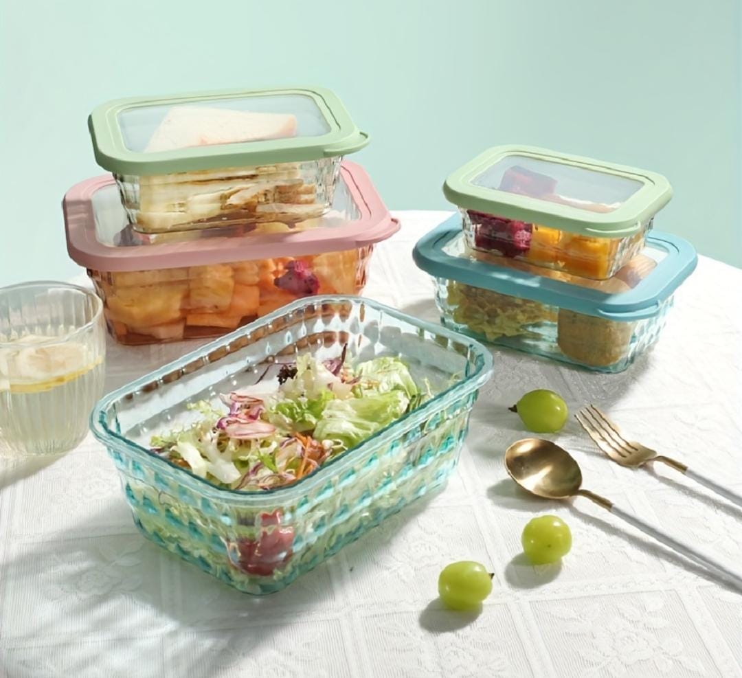 Set of three acrylic storage containers in assorted colors