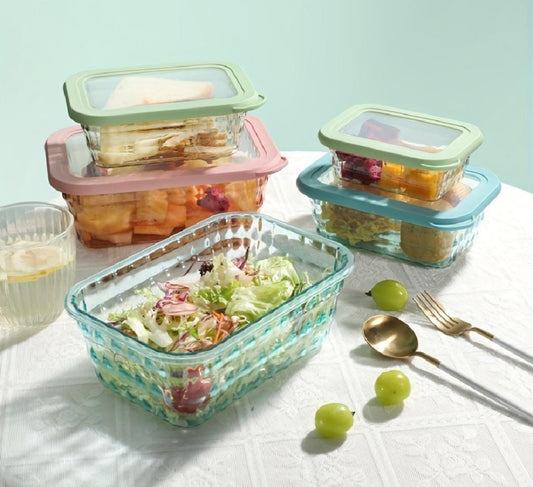 Set of three acrylic storage containers in assorted colors