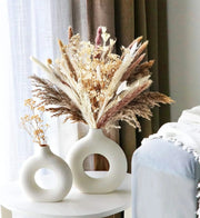 White ceramic Nordic circular donut vase with hollow center for modern home décor