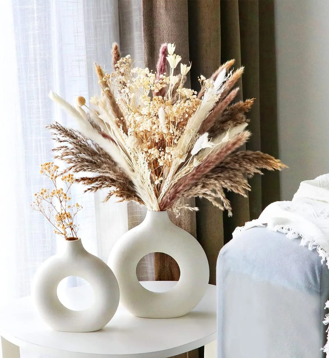 White ceramic Nordic circular donut vase with hollow center for modern home décor