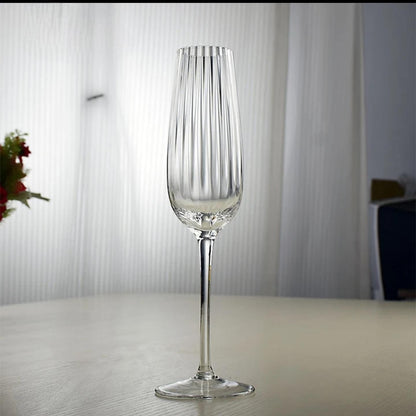 Ribbed long stem champagne flutes with 230 ml capacity in elegant design