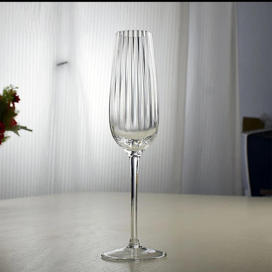 Ribbed long stem champagne flutes with 230 ml capacity in elegant design