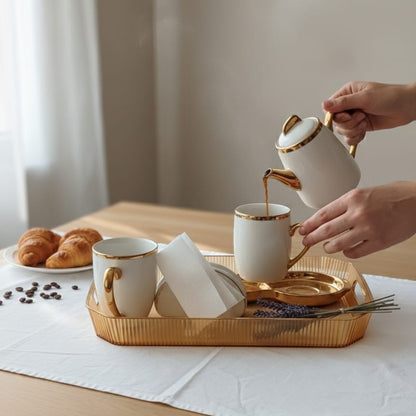 Luxury tea and coffee serving set with gold accents