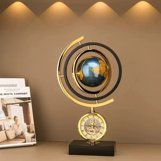 Gold globe with built-in clock on a marble base for elegant home or office décor