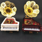 Piano-style music box with phonograph horn