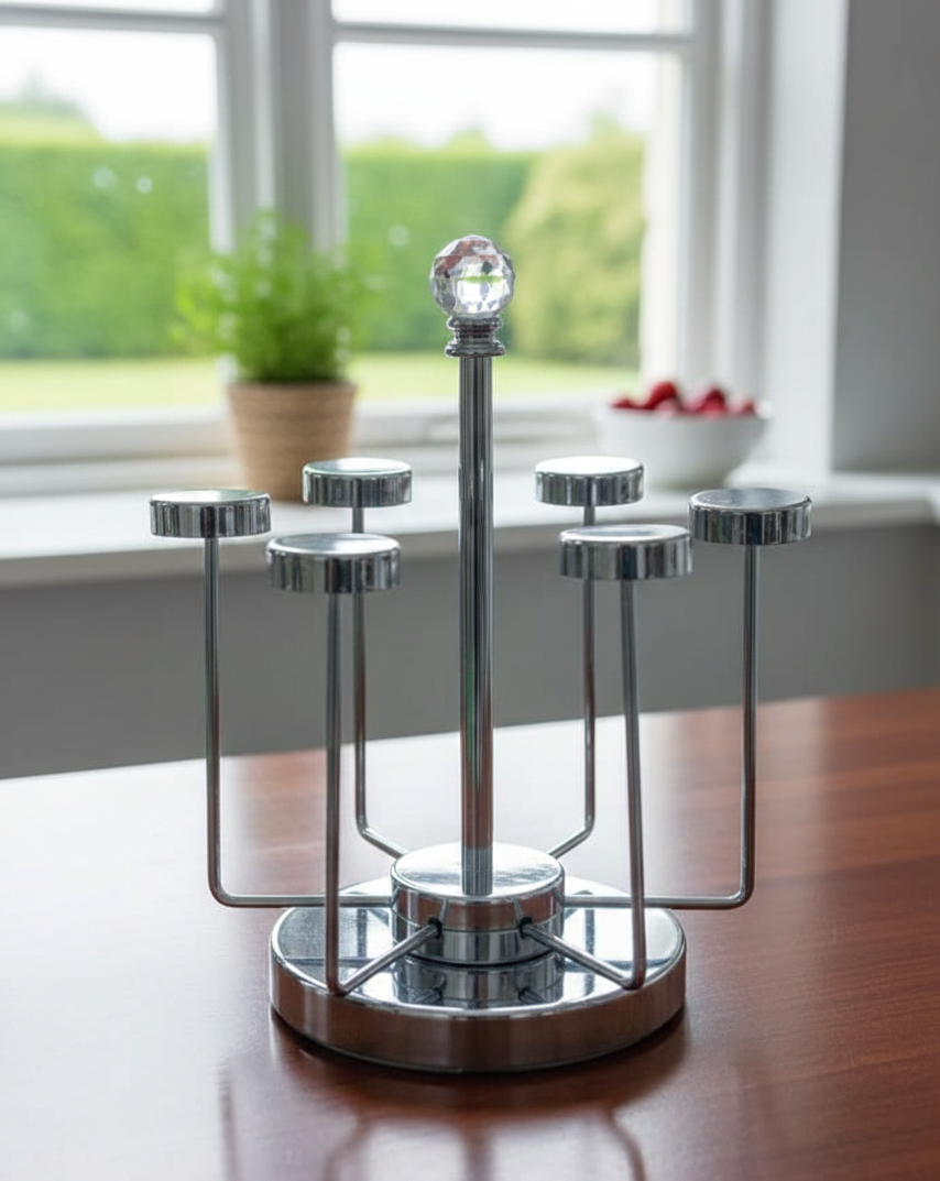 Stainless steel executive glass holder for office or home use.