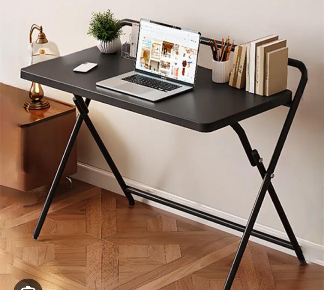 Folding table with sturdy metal frame for dining, working, studying, and space-saving home or office use.