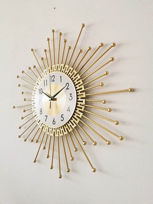 Large sun-shaped metal wall clock with silent mechanism for modern living room décor