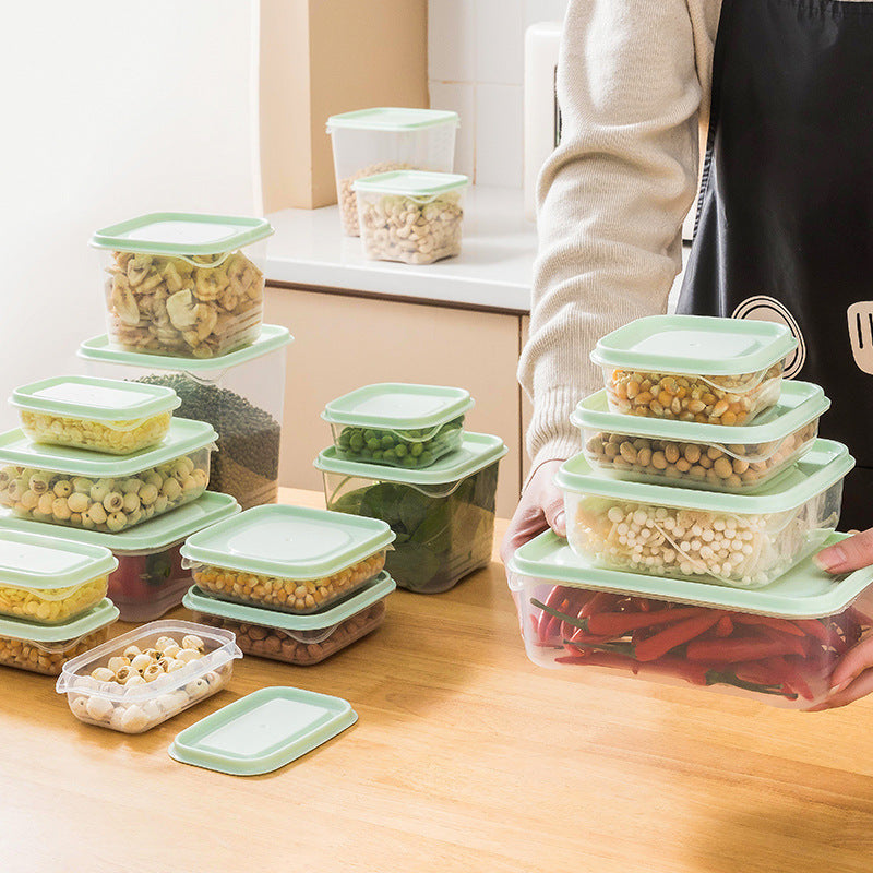 17-piece airtight crisper storage set in pink and lime green, food containers for fridge organization and freshness.