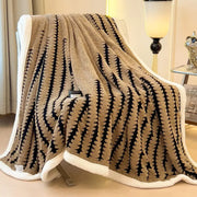 Large soft fleece blanket with thick cozy texture and stylish colors for home comfort.