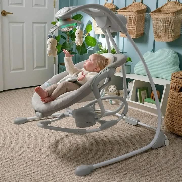 Baby swing with gentle motion and supportive seat for calming and relaxing babies