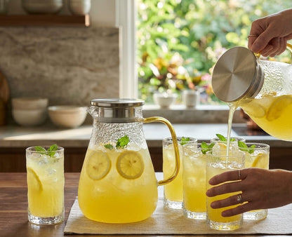 1500ml borosilicate glass water pitcher with stainless steel lid and ergonomic handle suitable for hot and cold drinks