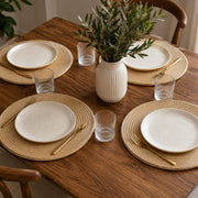 Set of six woven table mats with a durable woven design, 38 cm diameter, ideal for dining tables and home décor.