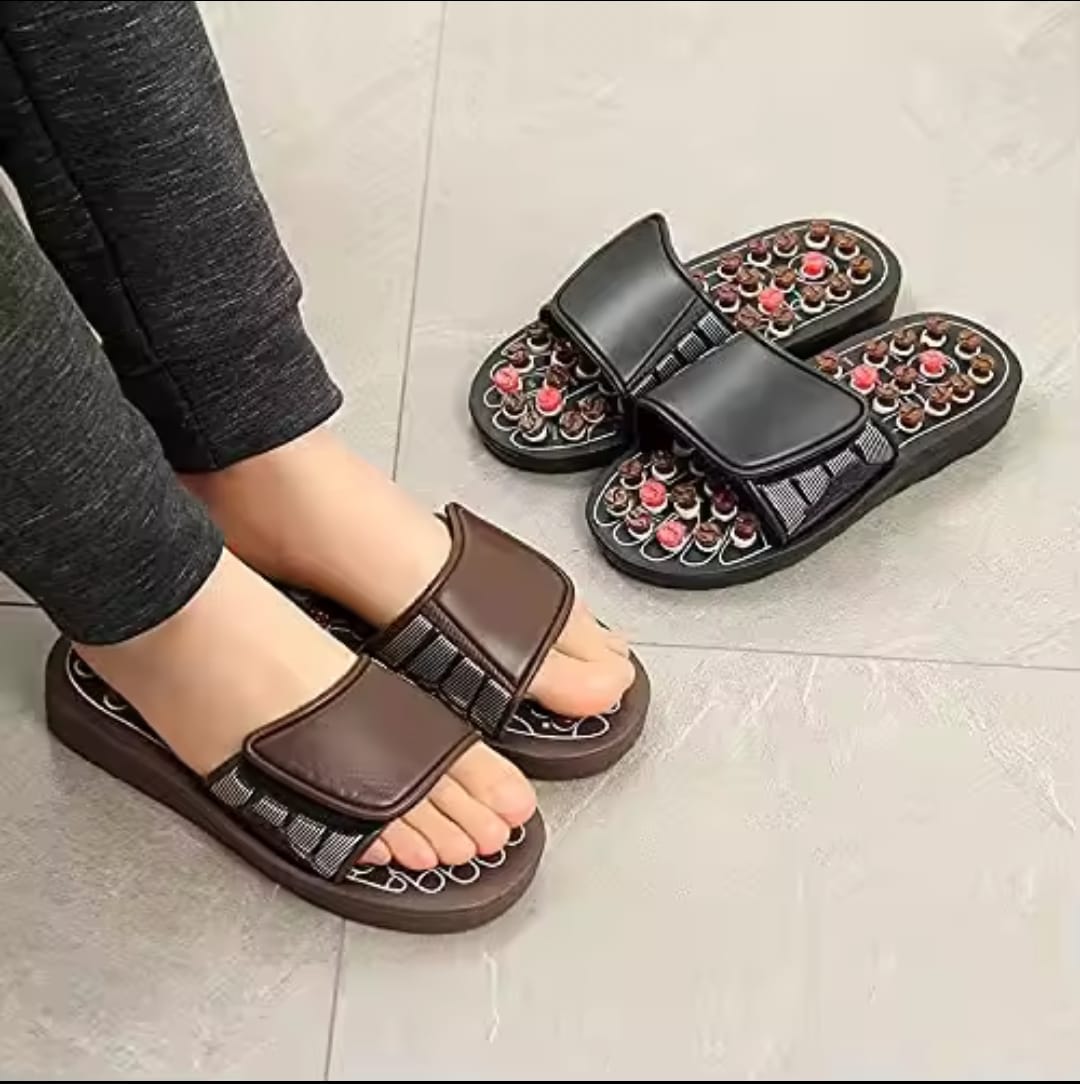 Acupuncture massage sandals with reflexology footbed for foot relaxation and comfort.