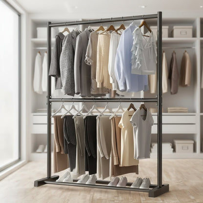 Clothing rack with clothes in a room with shelves and a window.